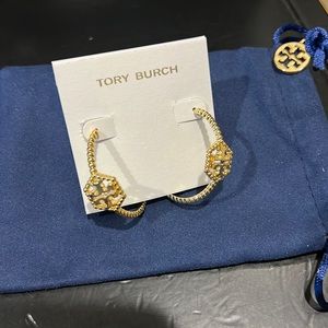 Tory Burch gold hexagon stud hoop earrings.